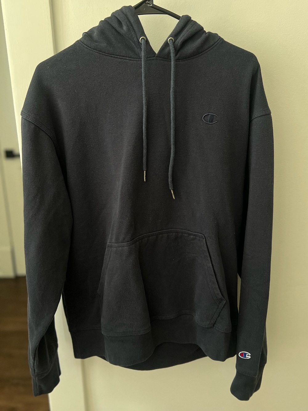 Champion Black Hooded Sweatshirt with Subtle Logo